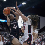
              South Carolina guard Kierra Fletcher (41) tries to shoot the ball while defended by Stanford guard Haley Jones, right, during the first half of an NCAA college basketball game in Stanford, Calif., Sunday, Nov. 20, 2022. (AP Photo/Godofredo A. Vásquez)
            