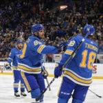 
              St. Louis Blues' Pavel Buchnevich (89) celebrates with Robert Thomas (18) after scoring a goal against the Anaheim Ducks during the second period of an NHL hockey game, Saturday, Nov. 19, 2022, in St. Louis. (AP Photo/Jeff Le)
            