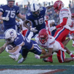 
              Connecticut running back Victor Rosa (22) scores a touchdown during the second half of an NCAA college football game against against Liberty in East Hartford, Conn., Saturday, Nov. 12, 2022. (AP Photo/Bryan Woolston)
            
