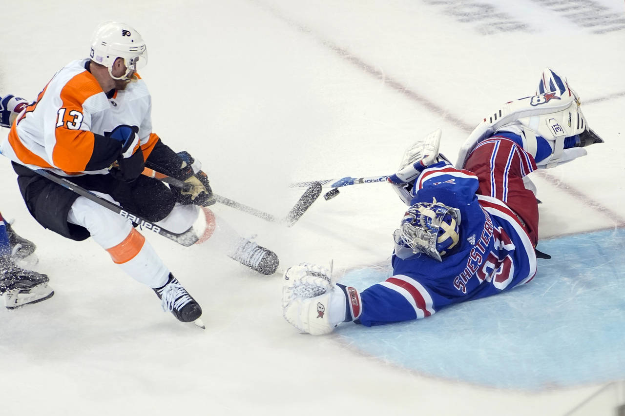 New York Rangers goaltender Igor Shesterkin (31) makes the save against Philadelphia Flyers center ...