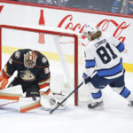 
              Anaheim Ducks goaltender John Gibson (36) saves a shot by Winnipeg Jets' Kyle Connor (81) during second-period NHL hockey game action in Winnipeg, Manitoba, Thursday, Nov. 17, 2022. (John Woods/The Canadian Press via AP)
            