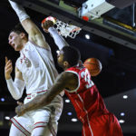 
              Houston forward Reggie Chaney (32) dunks over Saint Joseph's forward Kacper Klaczek (0) during the first half of an NCAA college basketball game at the Veterans Classic, Friday, Nov. 11, 2022, in Annapolis, Md. (AP Photo/Terrance Williams)
            