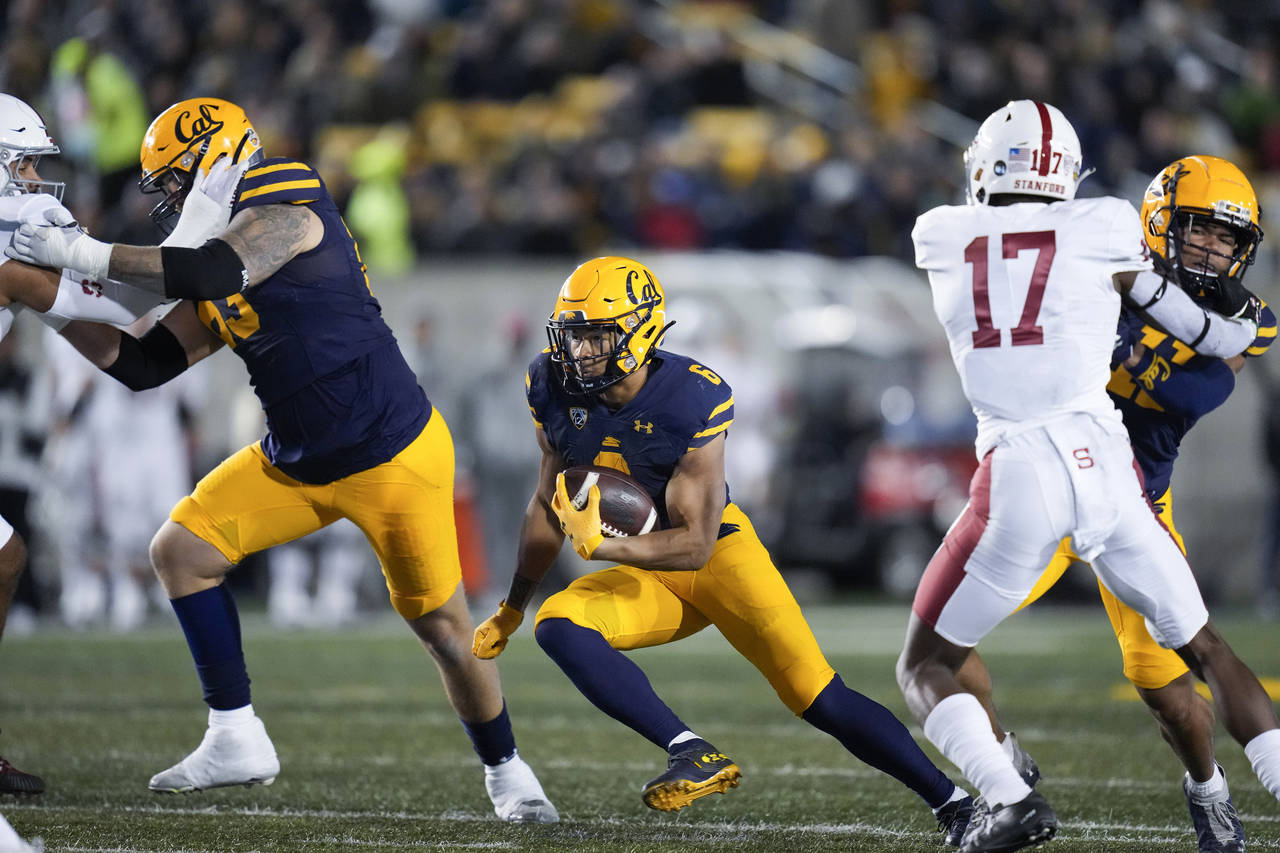 California running back Jaydn Ott (6) carries the ball against Stanford during the second half of a...
