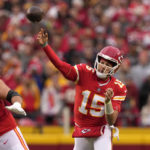 
              Kansas City Chiefs quarterback Patrick Mahomes (15) throws a pass during the first half of an NFL football game against the Los Angeles Rams Sunday, Nov. 27, 2022, in Kansas City, Mo. (AP Photo/Charlie Riedel)
            