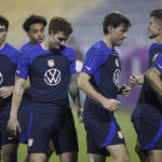 
              United States players participate in an official training session at Al-Gharafa SC Stadium, in Doha, Saturday, Nov. 19, 2022. (AP Photo/Ashley Landis)
            