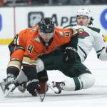 
              Anaheim Ducks' Cam Fowler, left, collides with Minnesota Wild's Mats Zuccarello during the first period of an NHL hockey game Wednesday, Nov. 9, 2022, in Anaheim, Calif. (AP Photo/Jae C. Hong)
            