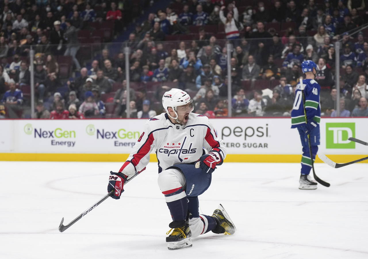 Washington Capitals' Alex Ovechkin celebrates a goal against the Vancouver Canucks during the first...