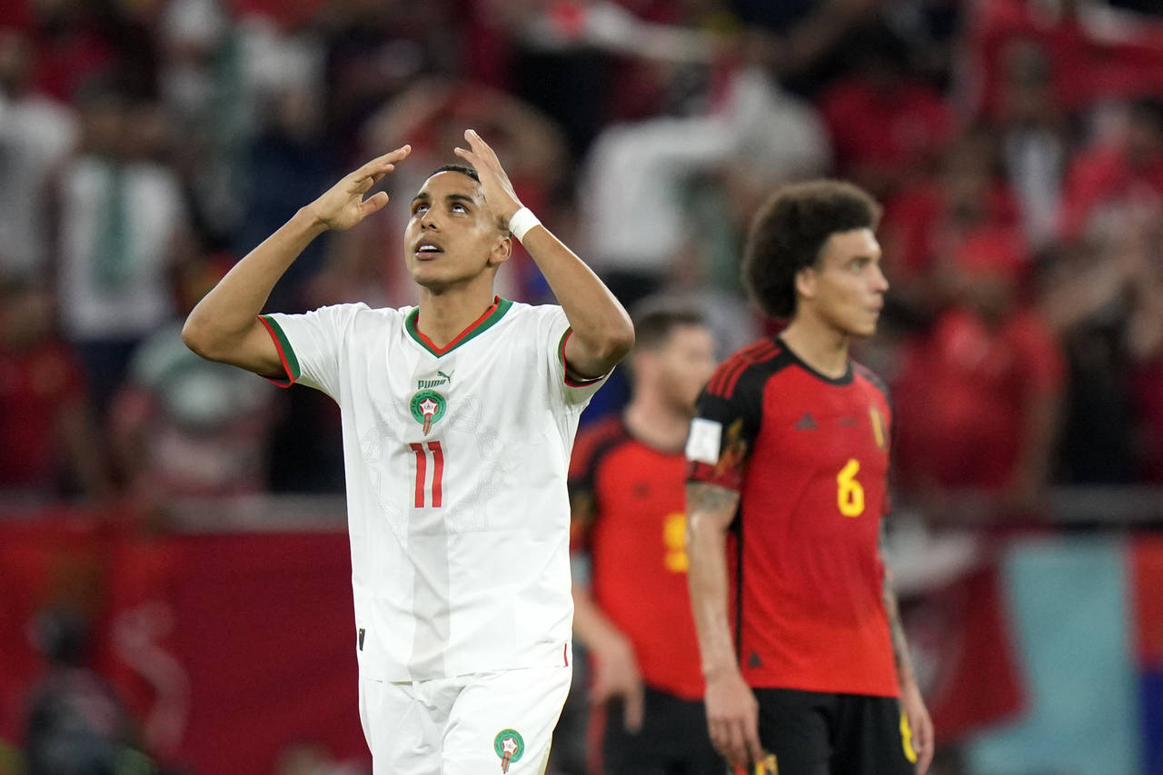 Morocco's Abdelhamid Sabiri celebrates after scoring the opening goal during a World Cup group F so...