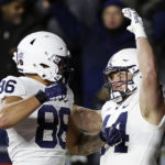 
              Penn State tight end Tyler Warren (44) celebrates a touchdown against Rutgers during the first half of an NCAA college football game Saturday, Nov. 19, 2022, in Piscataway, N.J. (AP Photo/Adam Hunger)
            