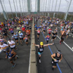 
              Runners cross the Verrazzano-Narrows Bridge at the start of the New York City Marathon in New York, Sunday, Nov. 6, 2022. (AP Photo/Seth Wenig)
            
