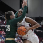 
              Stanford forward Kiki Iriafen, right, is fouled by Cal Poly forward Natalia Ackerman (35) during the first half of an NCAA college basketball game in Stanford, Calif., Wednesday, Nov. 16, 2022. (AP Photo/Godofredo A. Vásquez)
            