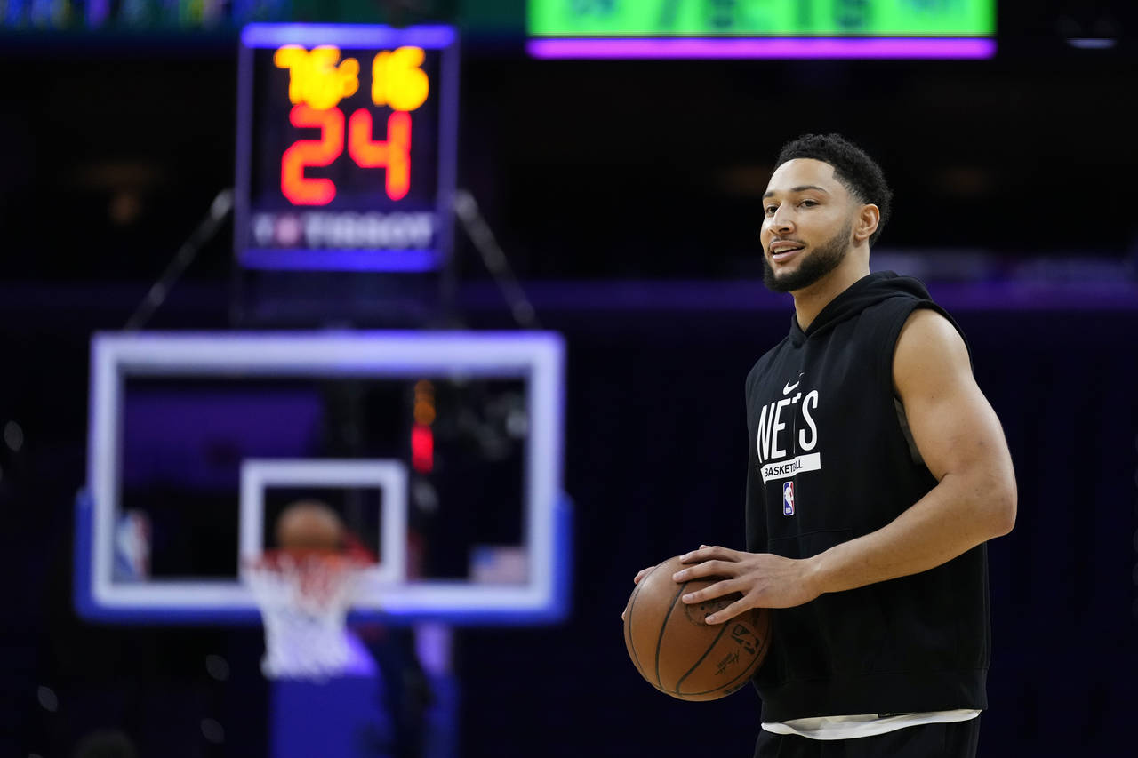 Brooklyn Nets' Ben Simmons warms up before an NBA basketball game against the Philadelphia 76ers, T...