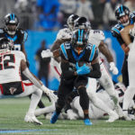 
              Carolina Panthers running back D'Onta Foreman runs against the Atlanta Falcons during the first half of an NFL football game on Thursday, Nov. 10, 2022, in Charlotte, N.C. (AP Photo/Rusty Jones)
            