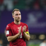 
              Denmark's Christian Eriksen salutes supporters at the end of the World Cup group D soccer match between Denmark and Tunisia, at the Education City Stadium in Al Rayyan , Qatar, Tuesday, Nov. 22, 2022. (AP Photo/Petr David Josek)
            