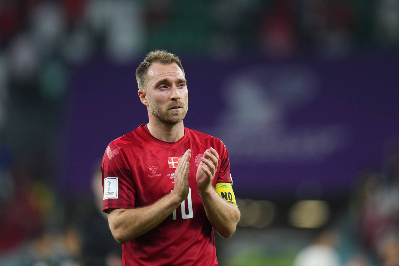 Denmark's Christian Eriksen salutes supporters at the end of the World Cup group D soccer match bet...