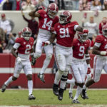 
              Alabama defensive back Brian Branch (14) celebrates his interception with defensive lineman Jaheim Oatis (91) during the second half of an NCAA college football game against Austin Peay, Saturday, Nov. 19, 2022, in Tuscaloosa, Ala. (AP Photo/Vasha Hunt)
            