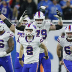 
              Teammates react after Buffalo Bills place kicker Tyler Bass (2) kicked a 45-yard game winning field goal in the closing seconds of an NFL football game against the Detroit Lions, Thursday, Nov. 24, 2022, in Detroit. (AP Photo/Duane Burleson)
            