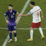 
              Poland's Robert Lewandowski, right, interacts with Argentina's Lionel Messi at the end of the World Cup group C soccer match between Poland and Argentina at the Stadium 974 in Doha, Qatar, Wednesday, Nov. 30, 2022. (AP Photo/Hassan Ammar)
            