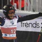 
              Second placed Sweden's Anna Swenn Larsson, celebrats after an alpine ski, women's World Cup slalom, in Levi, Finland, Saturday, Nov. 19, 2022. (AP Photo/Alessandro Trovati)
            