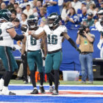 
              Philadelphia Eagles wide receiver Quez Watkins (16) celebrates after a touchdown against the Indianapolis Colts in the second half of an NFL football game in Indianapolis, Fla., Sunday, Nov. 20, 2022. (AP Photo/AJ Mast)
            
