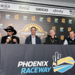 
              Richard Petty, Jimmie Johnson, Maury Gallagher, and Petty GMS team president Mike Beam, from left, are shown at a press conference at Phoenix Raceway in Avondale, Ariz., Friday, Nov. 4, 2022. Jimmie Johnson's NASCAR retirement and IndyCar experiment lasted all of two seasons. The seven-time NASCAR champion is returning in 2023 to the series that made him a global motorsports star as the part-owner of Petty GMS. (AP Photo/Jenna Fryer)
            