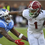 
              Alabama running back Jahmyr Gibbs (1) fights off Mississippi safety Otis Reese (3) during the first half of an NCAA college football game in Oxford, Miss., Saturday, Nov. 12, 2022. (AP Photo/Thomas Graning)
            