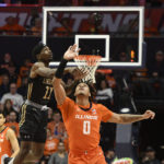 
              Illinois' Terrence Shannon Jr. (0) tips the ball away from Lindenwood's Kevin Caldwell Jr. during the first half of an NCAA college basketball game, Friday, Nov. 25, 2022, in Champaign, Ill. (AP Photo/Michael Allio)
            