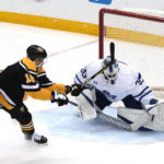 
              Pittsburgh Penguins' Jason Zucker (16) backhands a shot wide in front of Toronto Maple Leafs goaltender Matt Murray (30) during the first period of an NHL hockey game in Pittsburgh, Tuesday, Nov. 15, 2022. The Maple Leafs won 5-2. (AP Photo/Gene J. Puskar)
            