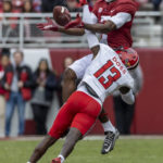 
              Austin Peay defensive back Cedarius Doss (13) deflects a pass meant for Alabama wide receiver Ja'Corey Brooks (7) during the first half of an NCAA college football game, Saturday, Nov. 19, 2022, in Tuscaloosa, Ala. (AP Photo/Vasha Hunt)
            