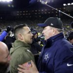 
              Green Bay Packers head coach Matt LaFleur, center left, and Dallas Cowboys head coach Mike McCarthy, center right, greet each other after the Packers 31-28 overtime win in an NFL football game Sunday, Nov. 13, 2022, in Green Bay, Wis. (AP Photo/Matt Ludtke)
            