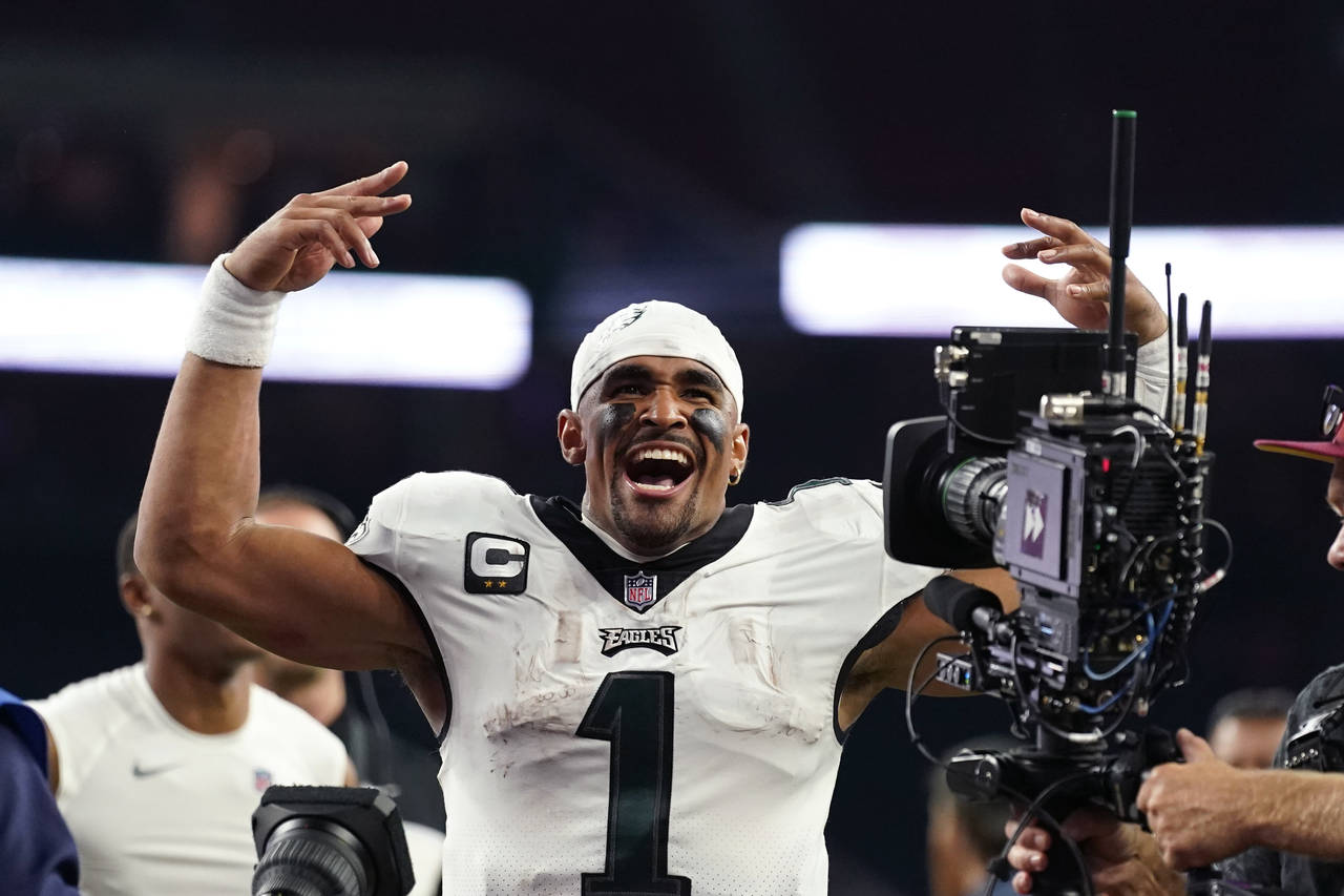 Philadelphia Eagles quarterback Jalen Hurts (1) reacts after defeating the Houston Texans in an NFL...