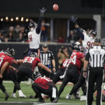 
              Atlanta Falcons place kicker Younghoe Koo (7) kicks a field goal against the Chicago Bears during the second half of an NFL football game, Sunday, Nov. 20, 2022, in Atlanta. (AP Photo/Brynn Anderson)
            