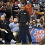 
              Monmouth head coach King Rice yells during the first half of an NCAA college basketball game against Virginia in Charlottesville, Va., Friday, Nov. 11, 2022. (AP Photo/Mike Kropf)
            