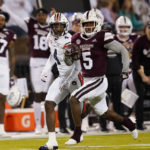 
              Mississippi State wide receiver Lideatrick Griffin (5) sprints past Auburn cornerback D.J. James (4) after a pass reception during the first half of an NCAA college football game in Starkville, Miss., Saturday, Nov. 5, 2022.(AP Photo/Rogelio V. Solis)
            