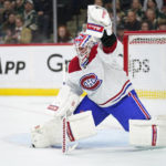 
              Montreal Canadiens goaltender Jake Allen (34) makes a stop during the first period of an NHL hockey game against the Minnesota Wild, Tuesday, Nov. 1, 2022, in St. Paul, Minn. (AP Photo/Abbie Parr)
            
