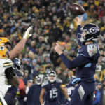 
              Tennessee Titans quarterback Ryan Tannehill (17) throws a pass under pressure from Green Bay Packers linebacker Preston Smith (91) during the second half of an NFL football game Thursday, Nov. 17, 2022, in Green Bay, Wis. (AP Photo/Morry Gash)
            