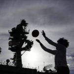 
              Gonzaga players warm up before the Carrier Classic NCAA college basketball game against Michigan State aboard the USS Abraham Lincoln in Coranado, Friday, Nov. 11, 2022. (AP Photo/Ashley Landis)
            