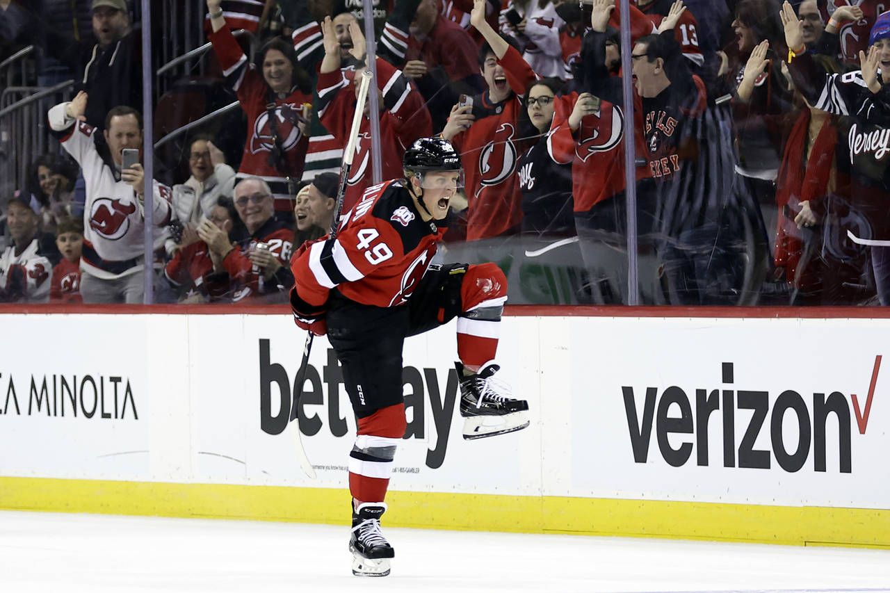 New Jersey Devils left wing Fabian Zetterlund reacts after scoring a goal against the Washington Ca...