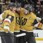 
              Vegas Golden Knights center Jack Eichel (9) and right wing Mark Stone, right, celebrate defenseman Alex Pietrangelo's goal against the Arizona Coyotes during the second period of an NHL hockey game Thursday, Nov. 17, 2022, in Las Vegas. (AP Photo/Sam Morris)
            
