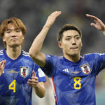 
              Japan's Ritsu Doan, right, celebrates after scoring his side's opening goal during the World Cup group E soccer match between Germany and Japan, at the Khalifa International Stadium in Doha, Qatar, Wednesday, Nov. 23, 2022. (AP Photo/Luca Bruno)
            