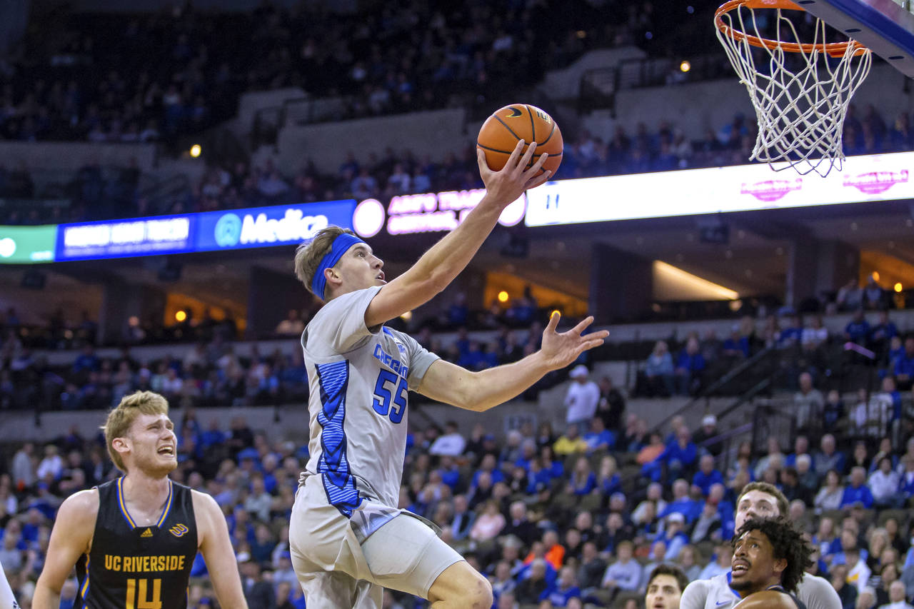 Creighton's Baylor Scheierman (55) makes a layup against UC Riverside during the first half of an N...