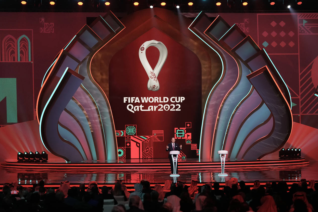 FILE - FIFA President Gianni Infantino speaks before the 2022 soccer World Cup draw at the Doha Exh...