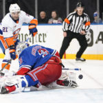 
              New York Islanders' Kyle Palmieri (21) shoots the puck past New York Rangers goaltender Igor Shesterkin (31) for a goal during the first period of an NHL hockey game Tuesday, Nov. 8, 2022, in New York. (AP Photo/Frank Franklin II)
            