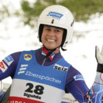 
              FILE - Emily Sweeney of United States reacts after her second run of the Luge World Cup women race in Sigulda, Latvia, Sunday, Jan. 9, 2022. Summer Britcher and Emily Sweeney have been USA Luge teammates for years. They’ve traveled together, they’ve competed together, they’ve gone to the Olympics together, they’ve stood on World Cup podiums together. Being on a sled together was not part of the plan. (AP Photo/Roman Koksarov, File)
            