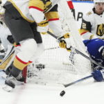 
              Toronto Maple Leafs forward Auston Matthews (34) tries a wrap around as Vegas Golden Knights defenseman Zach Whitecloud (2) defends during the second period of an NHL hockey game, Tuesday, Nov. 8, 2022 in Toronto. (Nathan Denette/The Canadian Press via AP)
            