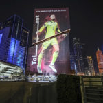 
              A giant FIFA World Cup advertisement on a skyscraper shows Germany's goalkeeper Manuel Neuer, reading "talent" in the center of Doha, Qatar, Friday, Nov. 18, 2022. (AP Photo/Martin Meissner)
            
