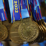 
              Finisher medals hang near the finish line of the New York City Marathon, Sunday, Nov. 6, 2022, in New York. (AP Photo/Jason DeCrow)
            