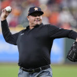 
              FILE - Former Houston Astros player Roger Clemens throws out a ceremonial pitch ahead of Game 1 of baseball's American League Championship Series between the Houston Astros and the New York Yankees, Wednesday, Oct. 19, 2022, in Houston. Steroids-tainted stars Barry Bonds, Roger Clemens and Rafael Palmeiro are on the eight-man ballot for the Hall of Fame’s contemporary baseball era committee, which meets Sept. 4 in San Diego. (AP Photo/Kevin M. Cox, File)
            