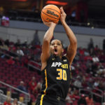 
              Appalachian State guard Tyree Boykin (30) takes a shot during the first half of an NCAA college basketball game against Louisville in Louisville, Ky., Tuesday, Nov. 15, 2022. (AP Photo/Timothy D. Easley)
            