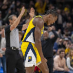 
              Indiana Pacers guard Bennedict Mathurin (00) reacts after scoring a three-point basket during the second half of an NBA basketball game against the Brooklyn Nets in Indianapolis, Friday, Nov. 25, 2022. (AP Photo/Doug McSchooler)
            